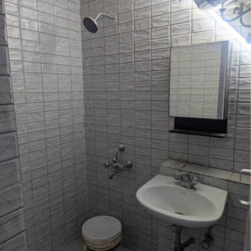 Bathroom in 2 BHK Apartment at Kosmos Heights, Sector 134 – for Rent