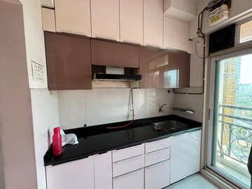 Kitchen in 2 BHK Apartment at Cosmos Jewels, Ghodbunder Road – for Sale