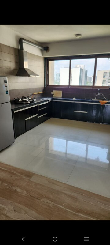 Kitchen in 4 BHK Apartment at Dev Atelier, Prahlad Nagar – for Rent
