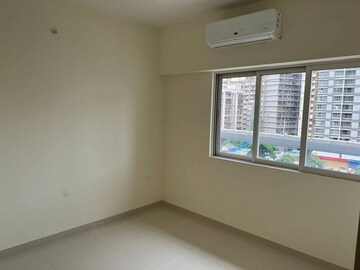 Room in 1 BHK Apartment at Omkar Signet, Malad East – for Rent