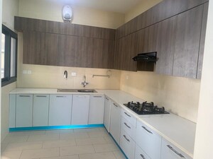 Kitchen in 3 BHK Apartment at Adani M2K Oyster Grande, Sector 102 – for Sale