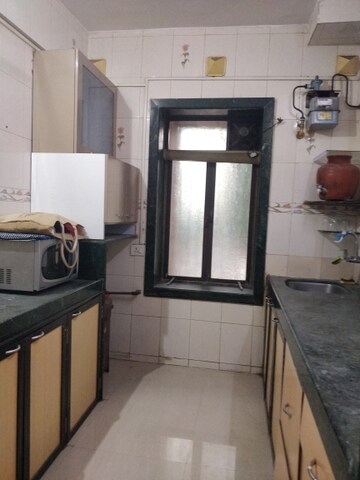 Kitchen in 2 BHK Apartment at Chikoowadi – for Rent