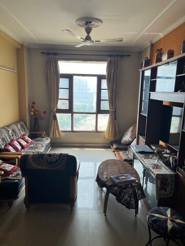 Living Room in 3 BHK Apartment at Mapsko Krishna Apra Gardens, Vaibhav Khand – for Sale