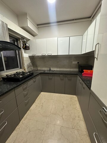 Kitchen in 3 BHK Apartment at Oberoi Realty Esquire, Goregaon East – for Rent