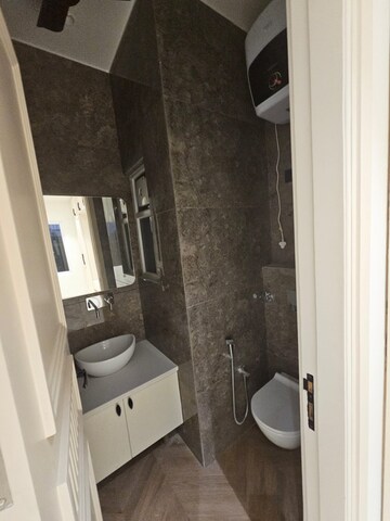 Bathroom in 4 BHK Builder Floor at Surajmal Vihar – for Sale
