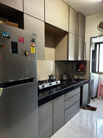 Kitchen in 1 BHK Apartment at Atul Blue Empire, Kandivali West – for Sale