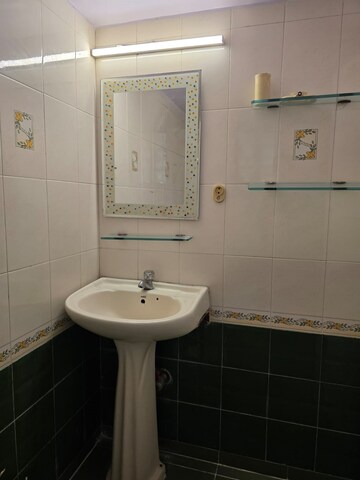 Bathroom in 2 BHK Apartment at Bandra West – for Rent
