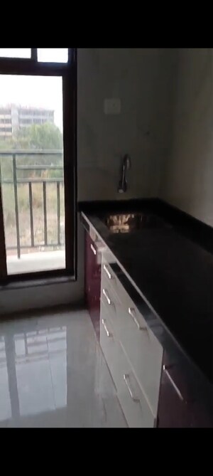Kitchen in 1 BHK Apartment at Audrey Avenue, Morya Nagar – for Sale