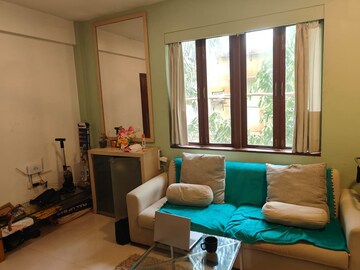 Living Room in 1 BHK Apartment at Bandra West – for Rent