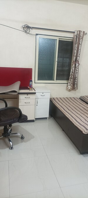 Master Bedroom in 1 BHK Apartment at ABC INN, Nigdi – for Rent