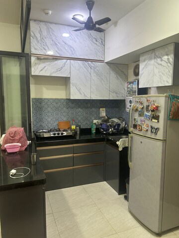 Kitchen in 2 BHK Apartment at Lodha Quality Home Tower 2, Majiwada – for Rent