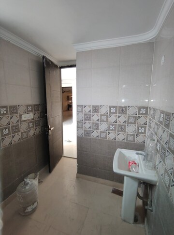 Bathroom in 4 BHK Builder Floor at YK Homes, Green Fields Colony – for Rent