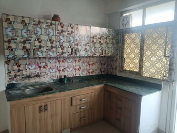 Kitchen in 2 BHK Apartment at Breez Global Heights, Sohna Sector 33 – for Rent