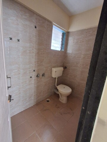 Bathroom in 2 BHK Apartment at Highland Windson Heights, Balkum Pada – for Rent