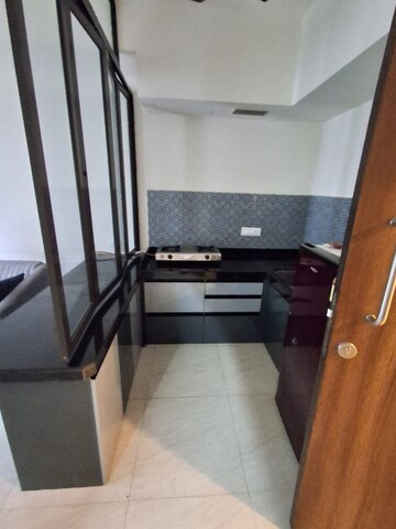 Kitchen in 1 BHK Apartment at Lodha Crown Quality Homes, Majiwada – for Rent