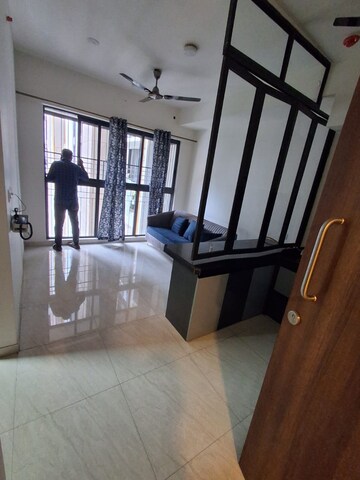 Living Room in 1 BHK Apartment at Lodha Crown Quality Homes, Majiwada – for Rent