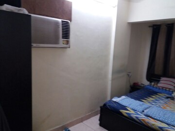Bedroom in 1 BHK Apartment at Sunset Heights, Prabhadevi – for Rent