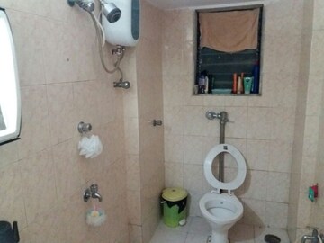 Bathroom in 1 BHK Apartment at Sunset Heights, Prabhadevi – for Rent