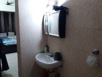 Bathroom in 1 BHK Apartment at Sunset Heights, Prabhadevi – for Rent
