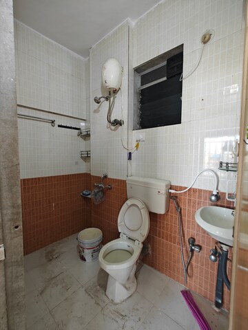 Bathroom in 2 BHK Apartment at Seawoods Sector 50 – for Rent