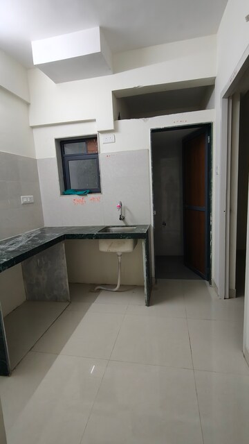 Kitchen in 1 BHK Apartment at Riddhi Garden, Malad East – for Rent