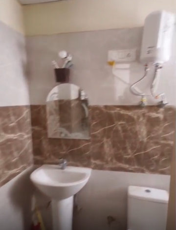 Bathroom in 2 BHK Apartment at SVP Gulmohur Garden, Raj Nagar Extension – for Sale