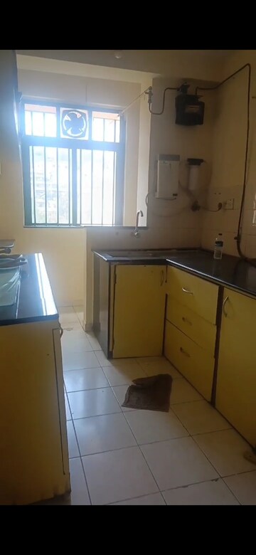 Kitchen in 2 BHK Apartment at Hiranandani Estate Capri, Ghodbunder Road – for Sale