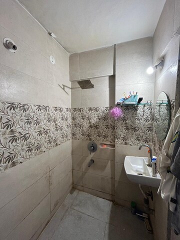 Bathroom in 2 BHK Apartment at Riddhi Enclave Co-op Housing Society Ltd, Viman Nagar – for Rent