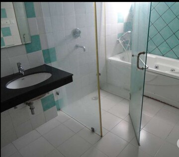 Bathroom in 4 BHK Apartment at Omaxe Heights II, Gomti Nagar – for Rent