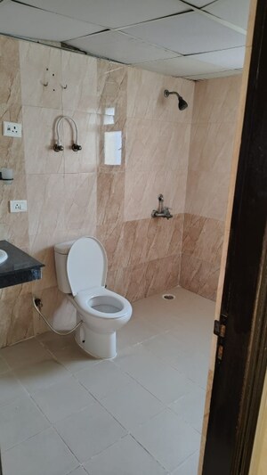 Bathroom in 2 BHK Apartment at Amrapali Golf Homes, Sector 4 Greater Noida – for Sale