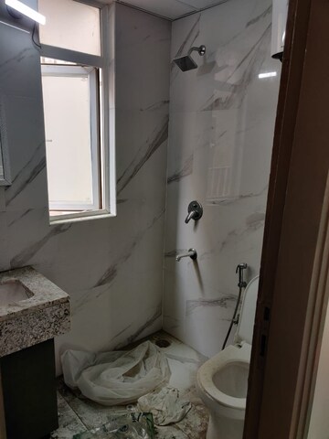 Bathroom in 2.5 BHK Builder Floor at Smart World Gems, Sector 89 – for Rent