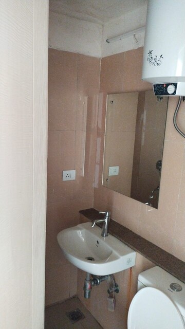 Bathroom in 3.5 BHK Apartment at M3M Golf Estate, Sector 65 – for Rent