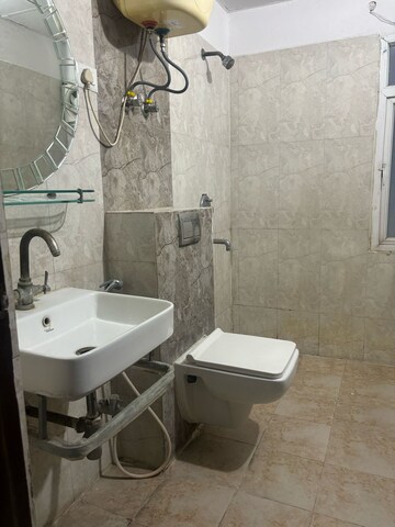 Bathroom in 3 BHK Apartment at Prateek Wisteria, Sector 77 – for Sale