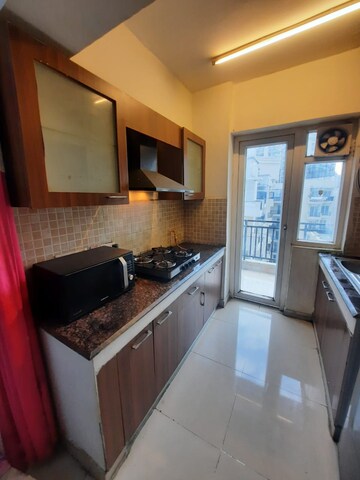 Kitchen in 2 BHK Apartment at Sethi Max Royale, Sector 76 – for Rent