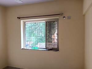Room in 1 BHK Apartment at Raj Ratna Park CHS, Brahmand – for Sale