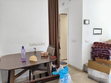 Living Room in 1 BHK Apartment at Hiranandani Estate Flora, Ghodbunder Road – for Rent