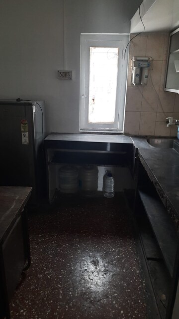 Kitchen in 2 BHK Apartment at Woodland Avenue, Kothrud – for Sale
