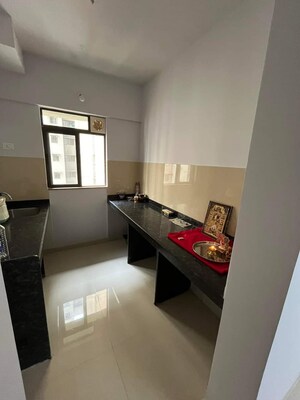 Kitchen in 1 BHK Apartment at Lodha Palava Downtown, Dombivli East – for Sale