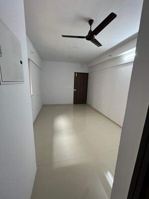 Living Room in 1 BHK Apartment at Lodha Palava Downtown, Dombivli East – for Sale