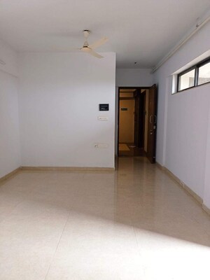 Living Room in 1 BHK Apartment at Lodha Palava City Lakeshore Greens, Dombivli East – for Sale