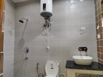 Bathroom in 2 BHK Builder Floor at Sahastradhara Road – for Rent