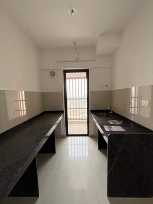 Kitchen in 2 BHK Apartment at Lodha Palava Downtown, Dombivli East – for Sale