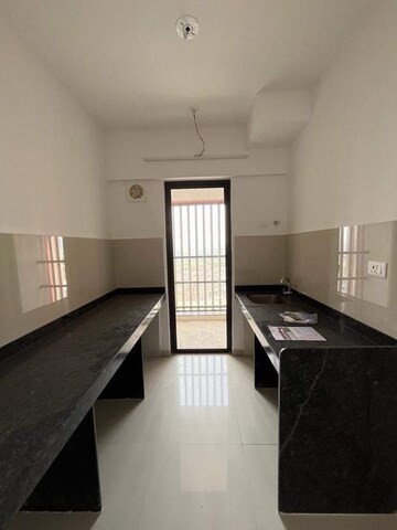 Kitchen in 2 BHK Apartment at Lodha Palava Downtown, Dombivli East – for Sale