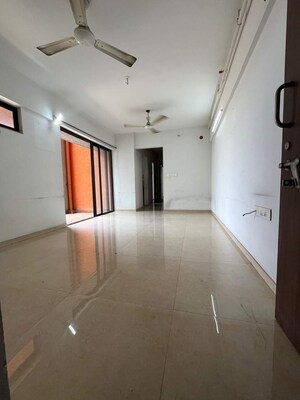 Living Room in 2 BHK Apartment at Lodha Palava Downtown, Dombivli East – for Sale