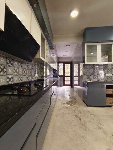 Kitchen in 4 BHK Apartment at Paras Quartier, Gwal Pahari – for Sale