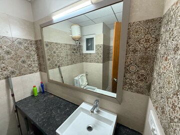Bathroom in 1 BHK Apartment at Paramount Golfforeste, Zeta I Greater Noida – for Rent