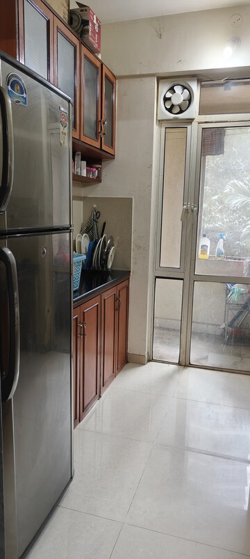 Kitchen in 1 BHK Apartment at Hiranandani Estate Flora, Ghodbunder Road – for Rent