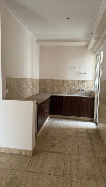 Kitchen in 3 BHK Apartment at Amrapali Golf Homes, Sector 4 Greater Noida – for Sale