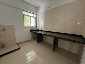 Kitchen in 2 BHK Apartment at Gananjay Society, Kothrud – for Sale