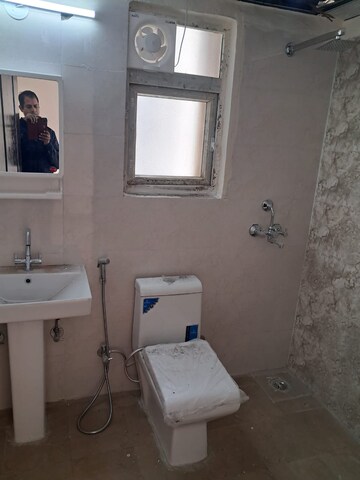 Bathroom in 2.5 BHK Apartment at Aims Greens Avenue, Sector 4 Greater Noida – for Sale